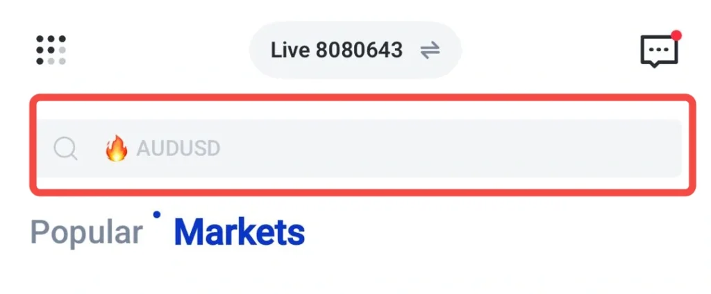 Campo de busca destacado com AUDUSD, ícone de lupa e emoji de fogo, contornado em vermelho