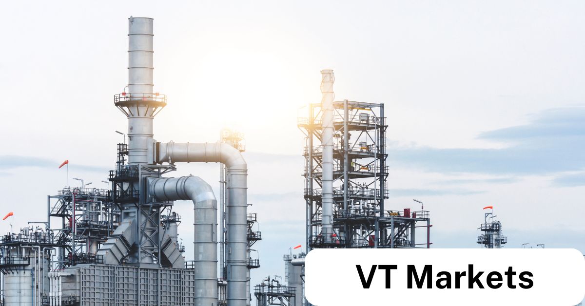 VT Markets A Complete Guide to VT Markets Energies Trading VT Markets An industrial refinery complex with towering chimneys and pipelines against a clear sky symbolising global energy markets and trading opportunities with VT Markets