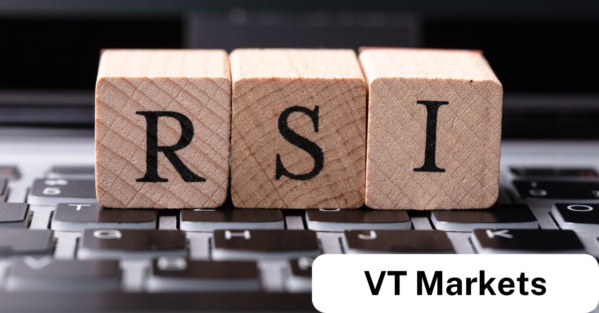 VT Markets What is RSI Divergence and How It Works VT Markets Wooden blocks spelling'RSI' placed on a keyboard, symbolizing RSI divergence and its importance in technical analysis for trading with VT Markets.