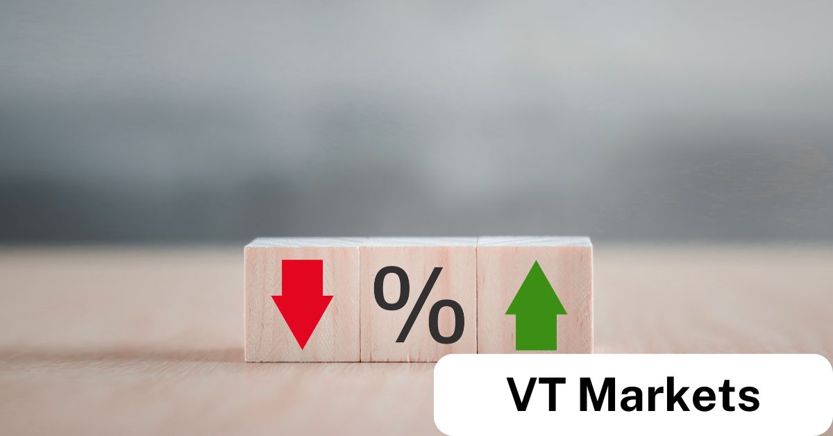 Wooden blocks showing a red down arrow percentage sign and green up arrowrepresenting the impact of overnight interest rates on trading positions with VT Markets